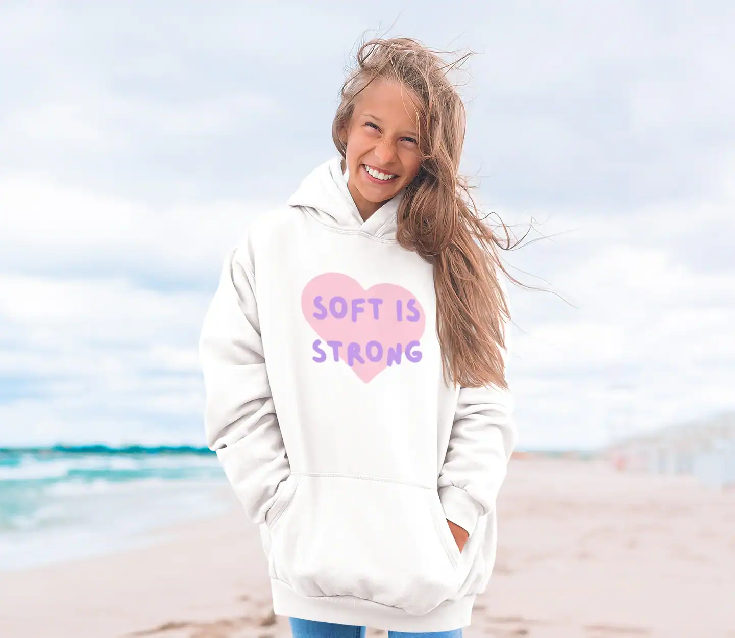 model wearing katseye soft is strong hoodie